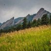 Boulder, Colorado is nestled below the Flatirons, a unique rock formation in the foothills of the Rocky Mountains. Flickr/Richard Schneider